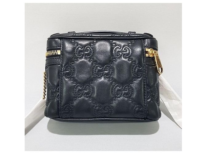 Gucci Mini borsa a tracolla con catena e manico superiore in matelassé GG - vista 4