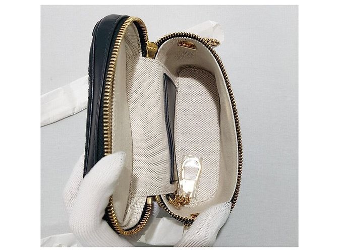 Gucci Mini borsa a tracolla con catena e manico superiore in matelassé GG - vista 7