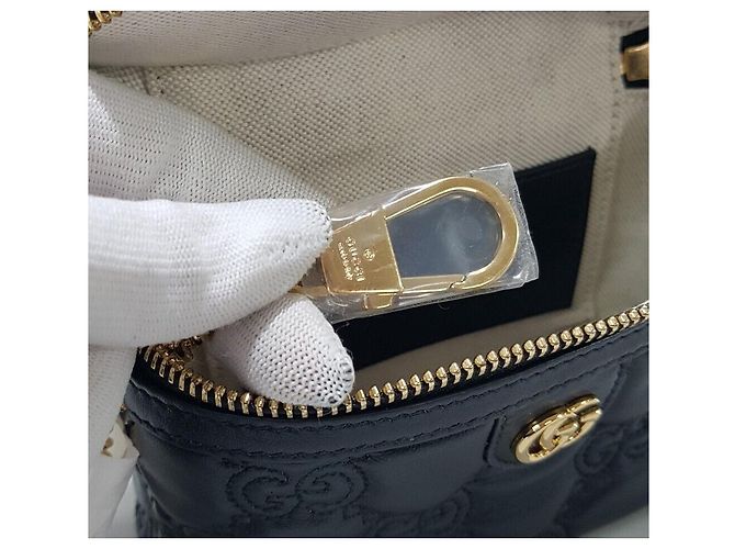 Gucci Mini borsa a tracolla con catena e manico superiore in matelassé GG - vista 8