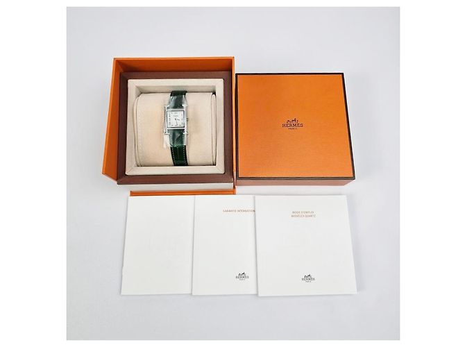 Hermès Relógio Heure para Mulher Modelo Pequeno Prateado com Diamantes e Pulseira de Alligator Verde - vista 11