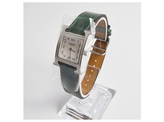 Hermès Relógio Heure para Mulher Modelo Pequeno Prateado com Diamantes e Pulseira de Alligator Verde - vista 5