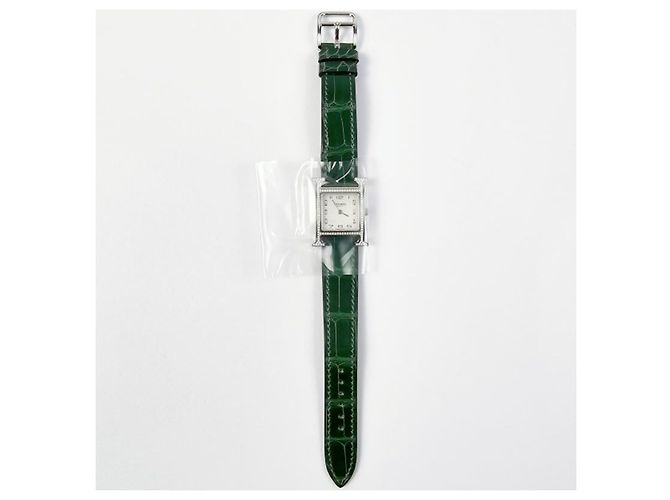 Hermès Relógio Heure para Mulher Modelo Pequeno Prateado com Diamantes e Pulseira de Alligator Verde - vista 6