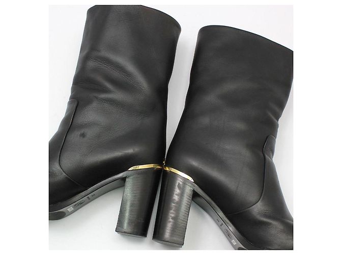 Chanel Mid Boots aus schwarzem Leder mit goldfarbenem CC-Logo - Ansicht 7
