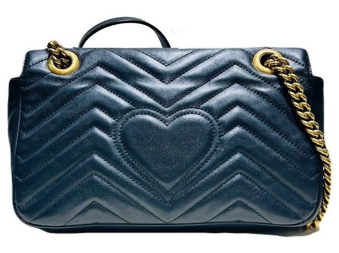 Gucci Borsa a tracolla GG Marmont piccola in pelle nera trapuntata con catena dorata - vista 2