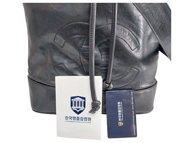 Chanel Black Lambskin CC Logo Drawstring Sling Bag Backpack - view 4