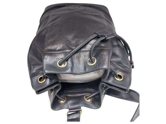 Chanel Black Lambskin CC Logo Drawstring Sling Bag Backpack - view 7