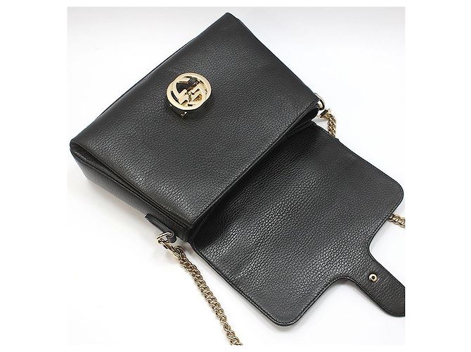 Gucci Bolsa de mão e de ombro com corrente e alça superior entrelazada em couro preto - vista 6