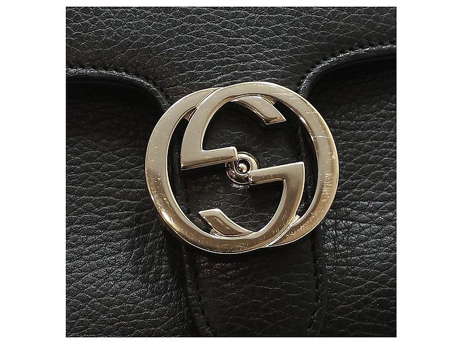 Gucci Bolsa de mão e de ombro com corrente e alça superior entrelazada em couro preto - vista 8
