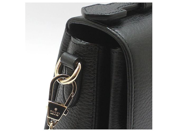 Gucci Bolsa de mão e de ombro com corrente e alça superior entrelazada em couro preto - vista 9