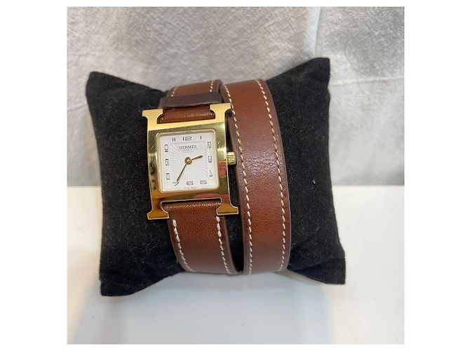 Hermès Relógio feminino de couro com banho de ouro e pulseira dupla Dourado - vista 3
