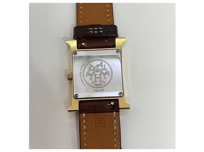 Hermès Relógio feminino de couro com banho de ouro e pulseira dupla Dourado - vista 6