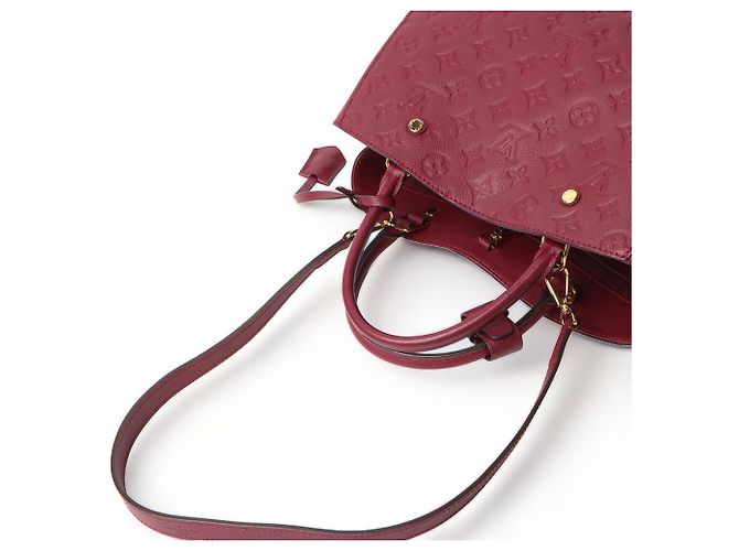 Louis Vuitton Borsa a tracolla Monogram Empreinte Montaigne MM Rosso - vista 4