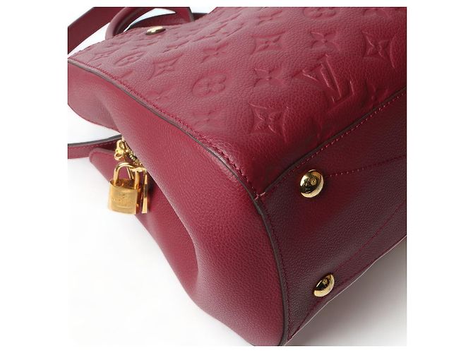 Louis Vuitton Borsa a tracolla Monogram Empreinte Montaigne MM Rosso - vista 5