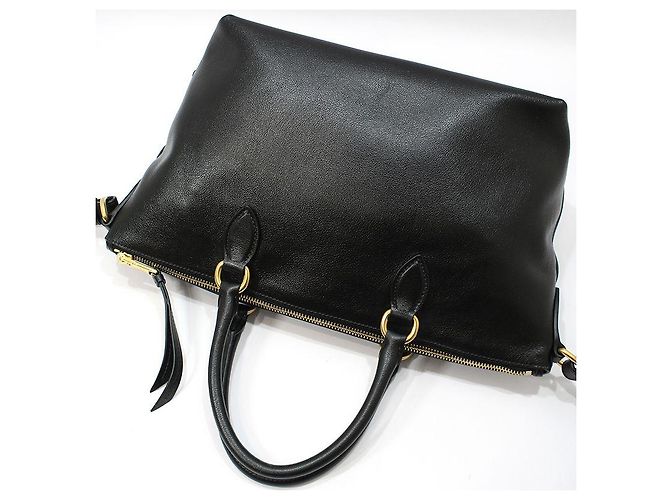 Prada Borsa a tracolla in pelle di vitello nera con logo in rilievo e finiture dorate Nero - vista 4