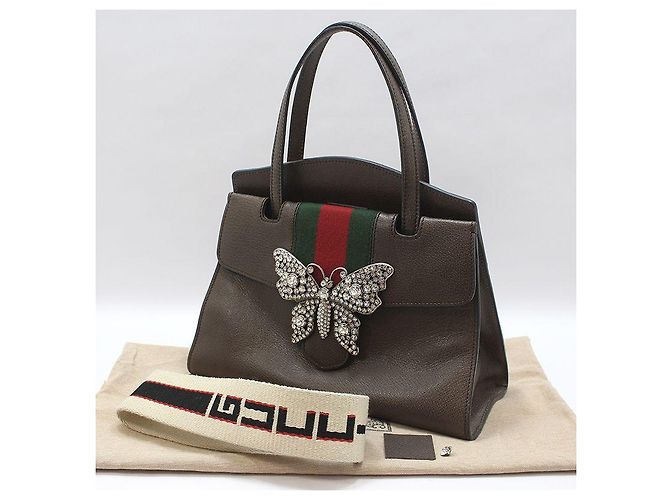 Gucci Borsa a mano e a spalla in pelle marrone con totem a farfalla di cristallo - vista 2