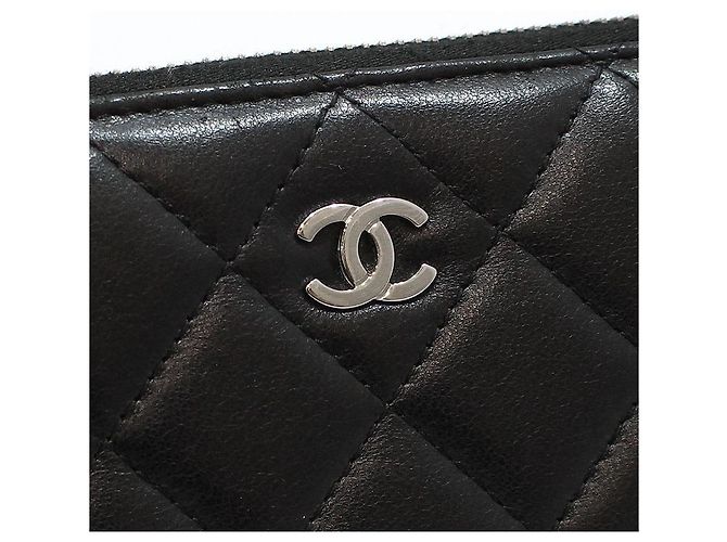 Chanel Portafoglio lungo classico in agnello nero con zip argentata - vista 7