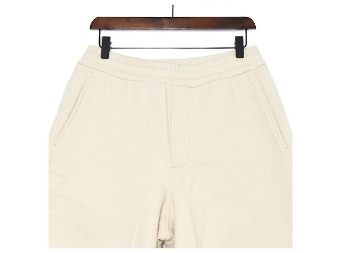 Prada Pantaloncini Bermuda in cotone avorio con logo dorato da uomo Bianco - vista 2