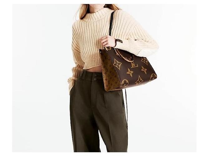 Louis Vuitton OnTheGo MM Monogram Negro - vista 7