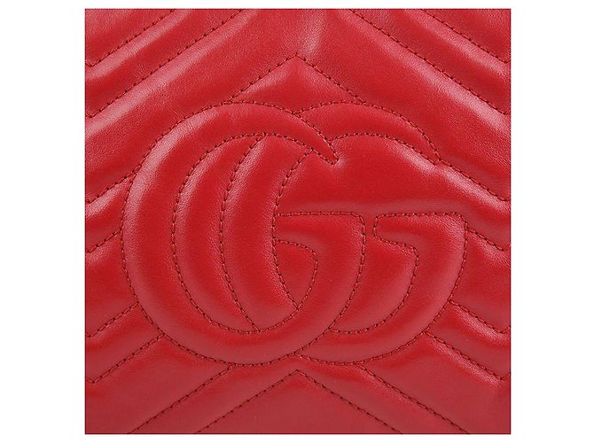 Gucci Piccola borsa a tracolla e crossbody in pelle matelassé rossa GG Marmont Rosso - vista 4