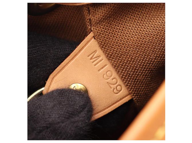 Zaino/Borsa Louis Vuitton Montsouris GM Monogram Marrone - vista 5