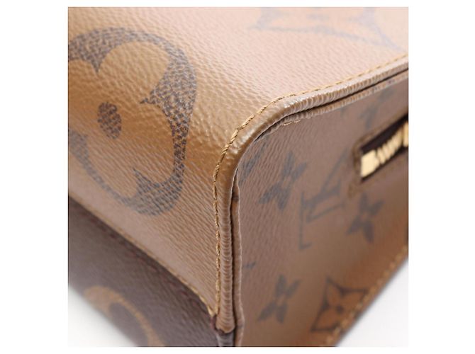 Borsa Louis Vuitton OnTheGo EW Monogram Giant Reverse Marrone - vista 6