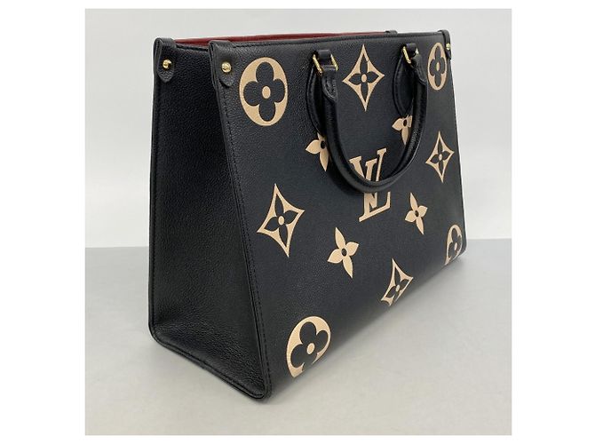 Borsa Tote Louis Vuitton Monogram Empreinte Bicolor OnTheGo MM Nero Beige - vista 2