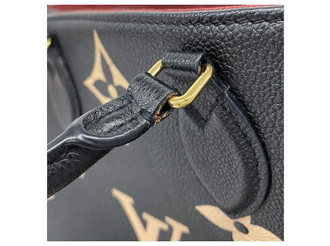 Borsa Tote Louis Vuitton Monogram Empreinte Bicolor OnTheGo MM Nero Beige - vista 8