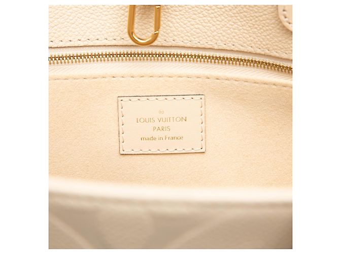 Louis Vuitton Marrone Monogram Empreinte OnTheGo MM Beige - vista 5
