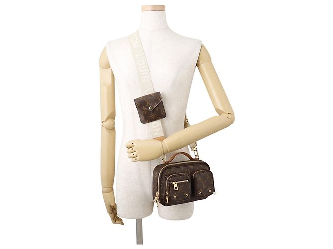 Borsa a tracolla e crossbody Louis Vuitton Monogram Utility Marrone Monogramma - vista 5
