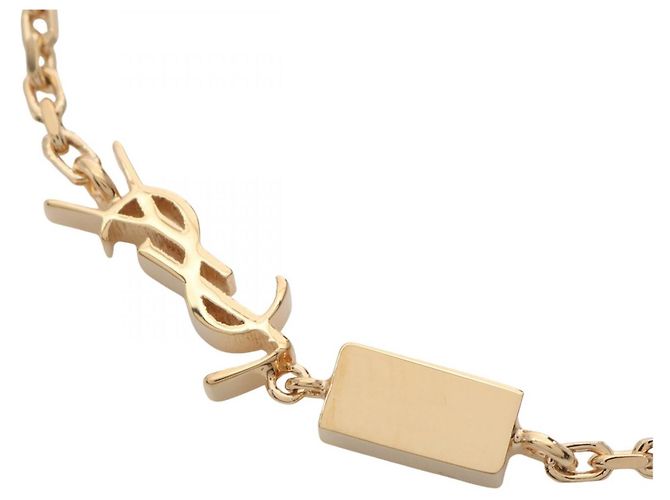 Yves Saint Laurent Bracciale Cassandra di Saint Laurent Paris D'oro Metallico - vista 3