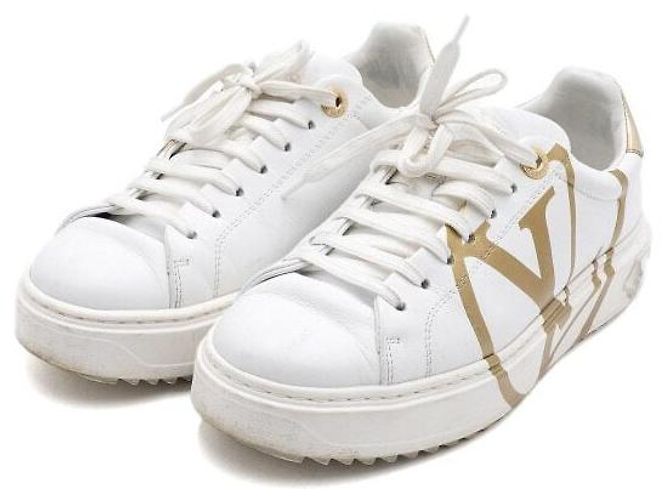 Louis Vuitton Sneaker Timeout da donna in pelle bianca con logo a cerchio dorato Bianco - vista 3