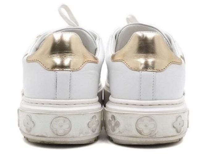 Louis Vuitton Sneaker Timeout da donna in pelle bianca con logo a cerchio dorato Bianco - vista 7