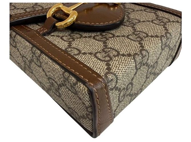 Horsebit 1955 Gucci Borsa a tracolla Horsebit GG Mini Canvas Marrone - vista 5