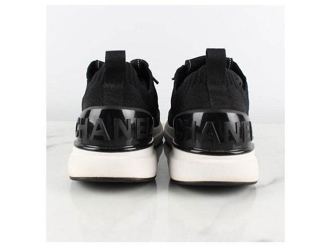Chanel Steppbare Strick-Sneaker mit Logo Schwarz - Ansicht 4