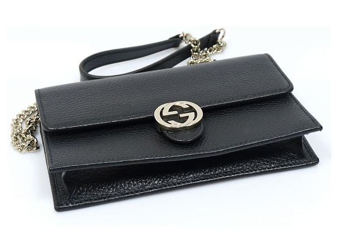 Gucci Bolsa transversal WOC em couro preto com GG entrelaçado e corrente dourada - vista 5