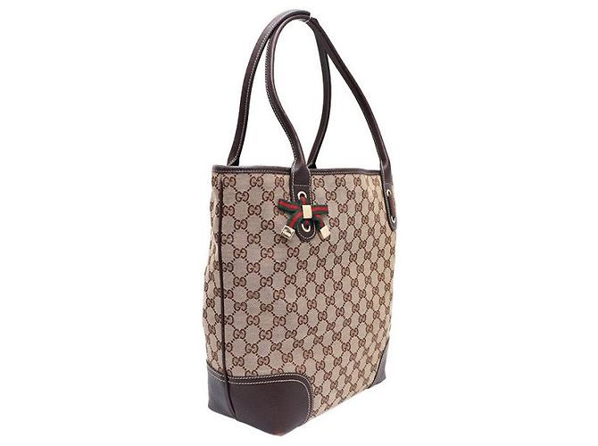Gucci Sac cabas et sac à bandoulière en toile GG avec logo ruban Marron - vue 10