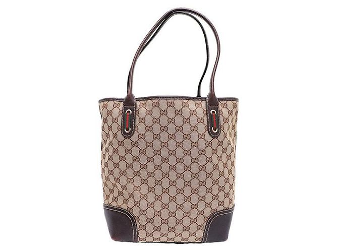 Gucci Sac cabas et sac à bandoulière en toile GG avec logo ruban Marron - vue 11