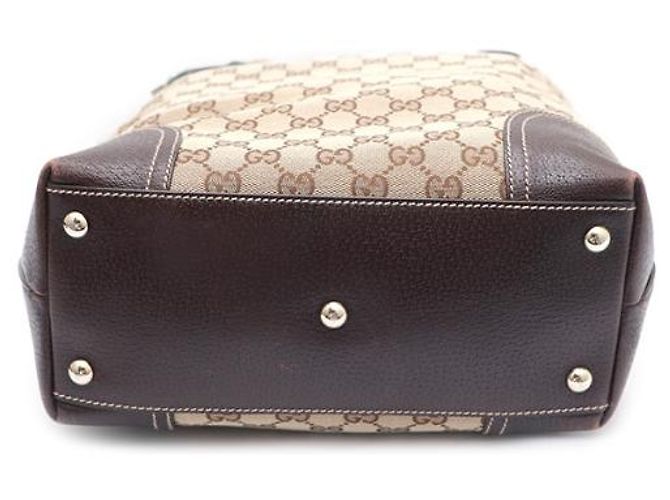 Gucci Sac cabas et sac à bandoulière en toile GG avec logo ruban Marron - vue 15