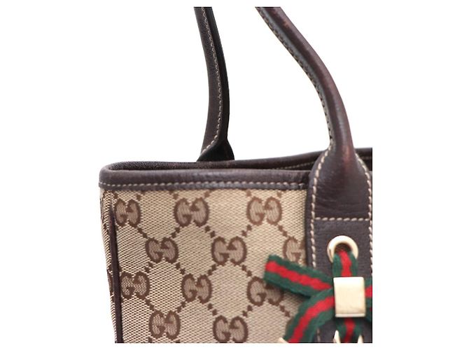Gucci Sac cabas et sac à bandoulière en toile GG avec logo ruban Marron - vue 5