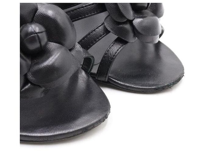 Chanel Scarpe con cinturino da donna in pelle nera con camelia CC Nero - vista 7