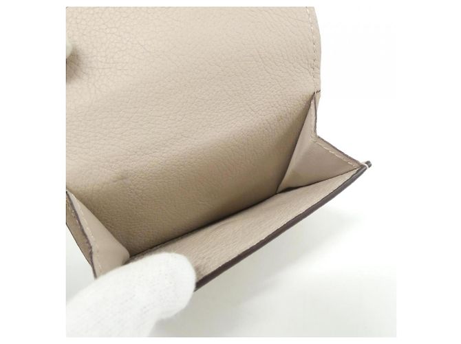 Cartera Louis Vuitton Lock Mini Gris - vista 7
