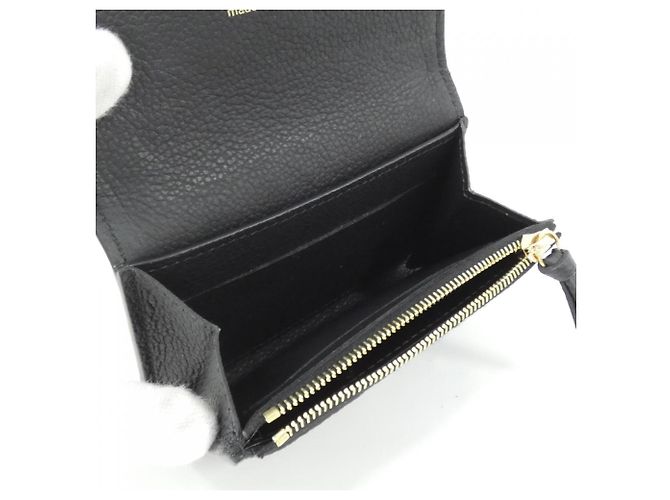 Monedero Monogram Empreinte Louis Vuitton Negro - vista 3