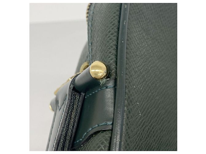 Clutch Louis Vuitton Taiga Kalga - vista 6