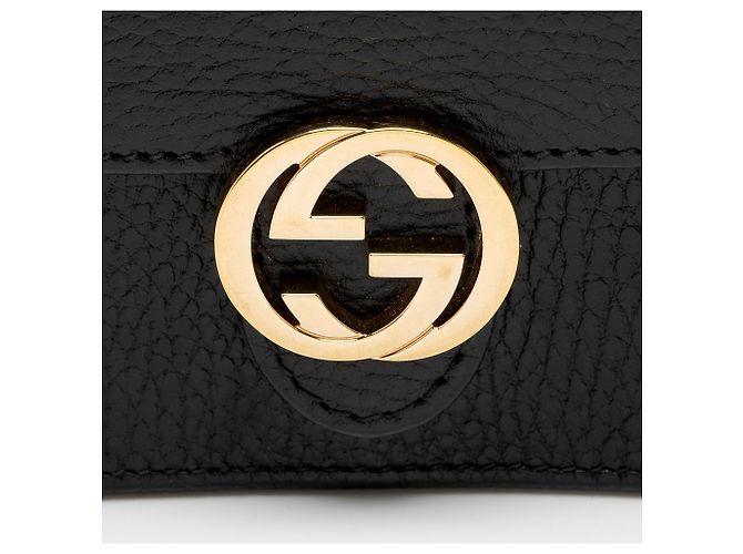 Cartera con cadena entrelazada G en piel de becerro granulada Gucci Negro - vista 9