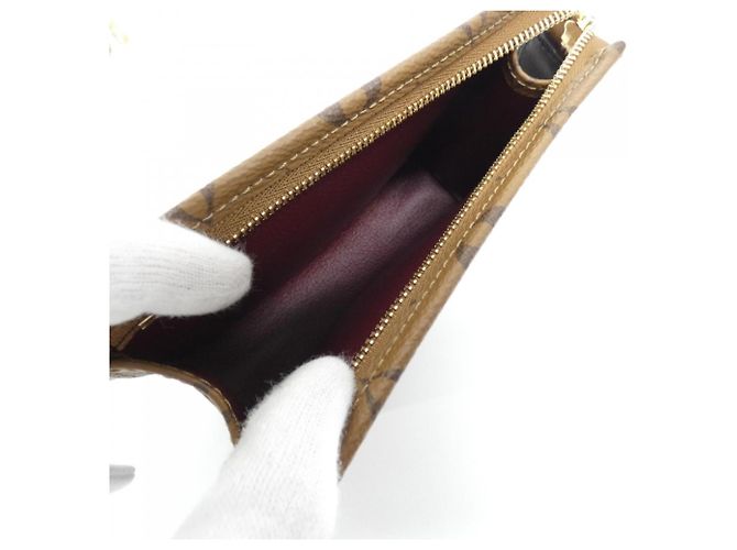 Louis Vuitton Monogram Reverse Trio Pochette Toilette Marrone - vista 8
