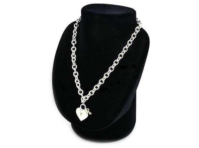 Colar Coração de Cadeado em Prata de Lei e Ouro Amarelo 18K da Tiffany & Co. - vista 6