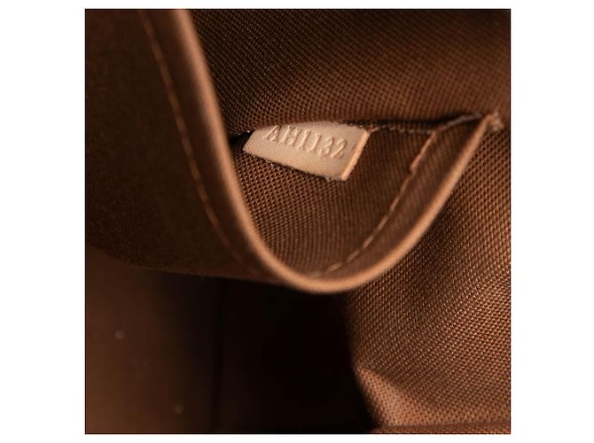 Louis Vuitton Marrone Monogram Tivoli PM - vista 6