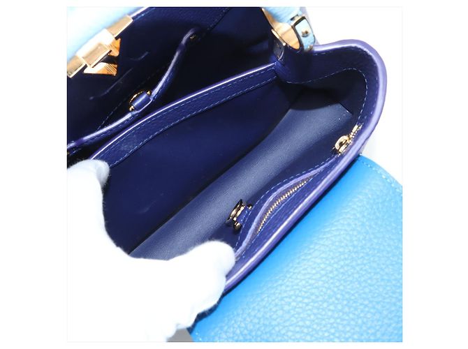 Louis Vuitton Borsa Capucines BB in pelle Taurillon blu - vista 8