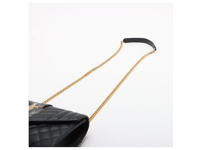 Saint Laurent Pequena bolsa de ombro em couro preto com matelassê chevron
Modelo Envelope - vista 5