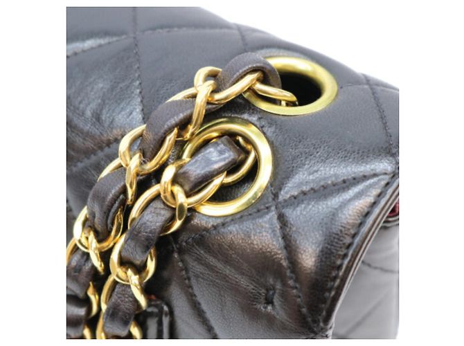 CHANEL Borsa a tracolla in pelle di agnello trapuntata con doppia patta nera Nero - vista 9